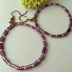 Purple and gold alternating beaded earrings.