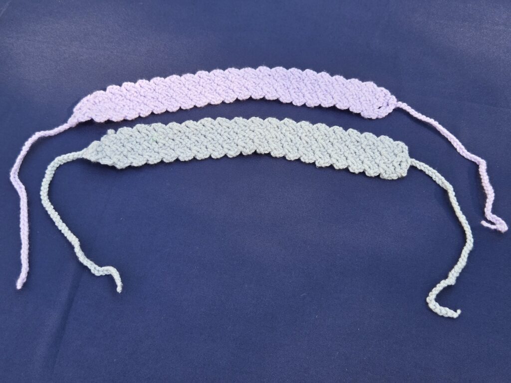 Set of 2 headbands, hand crocheted. 1 soft teal, 1 gray. Girls or women.