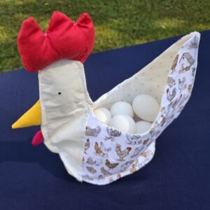 Chicken shaped basket holds up to a dozen eggs. Lays flat when not in use for easy storage.