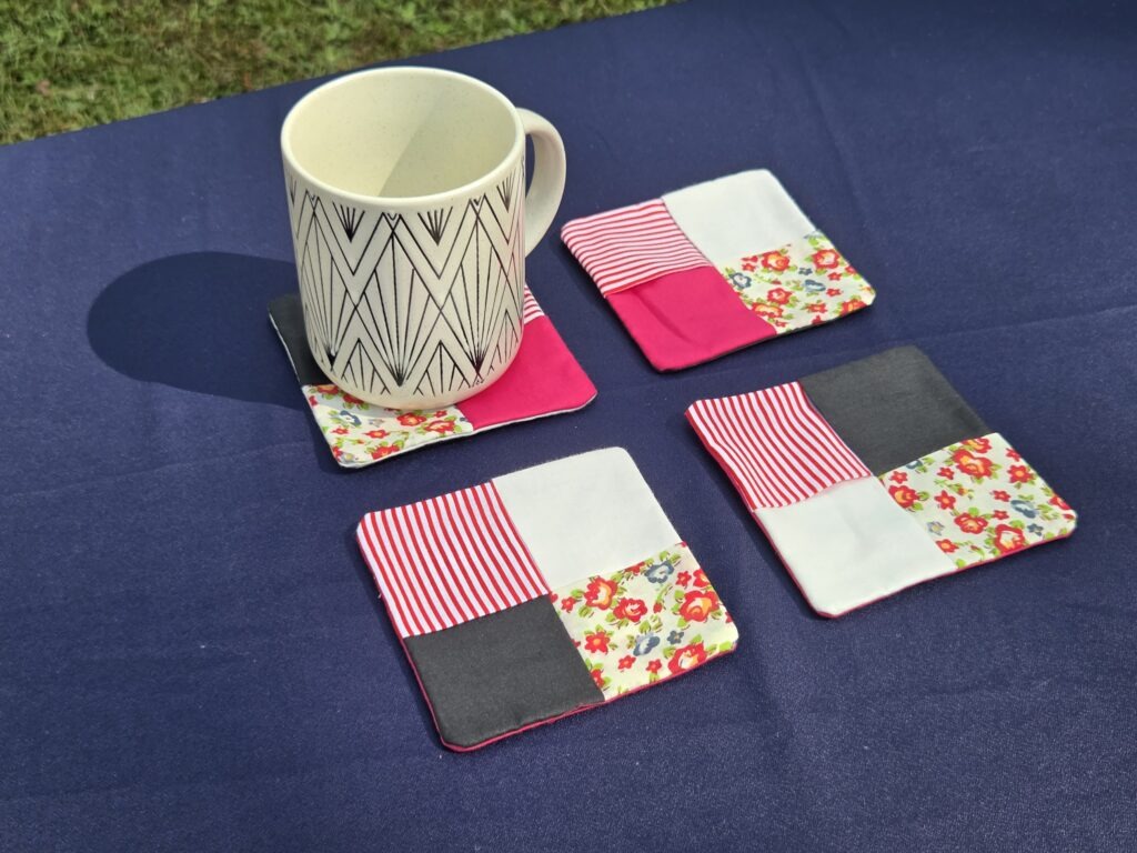 Set of 4 coasters, fabric, colors red, black, and white