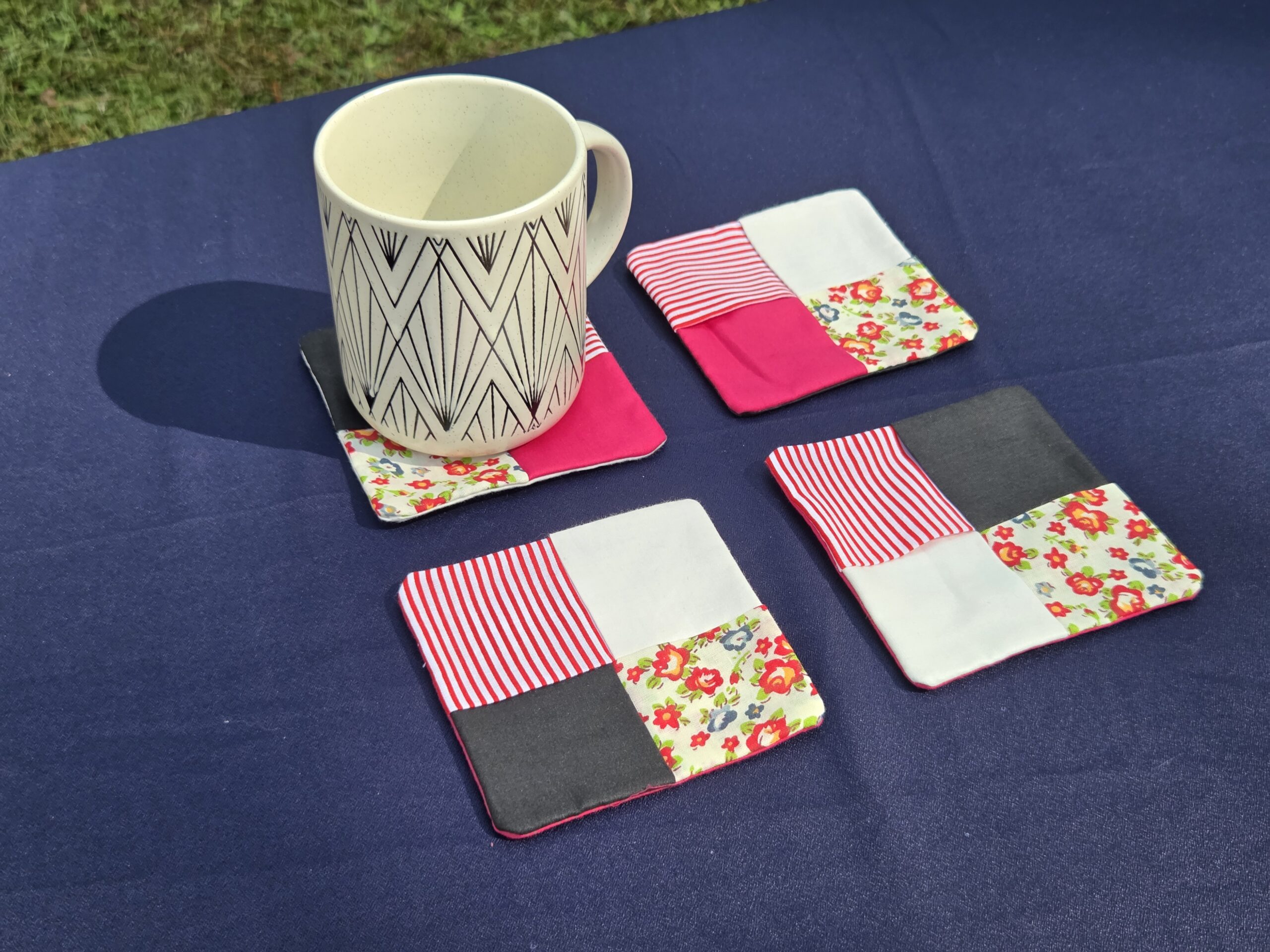 Set of 4 coasters, fabric, colors red, black, and white