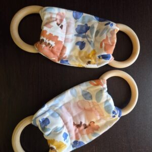Multicolored dish towel hanger/holder with wooden rings