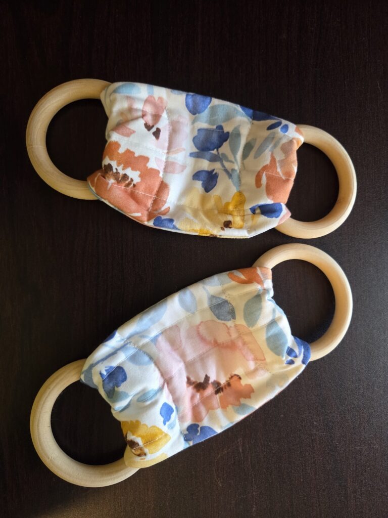 Multicolored dish towel hanger/holder with wooden rings