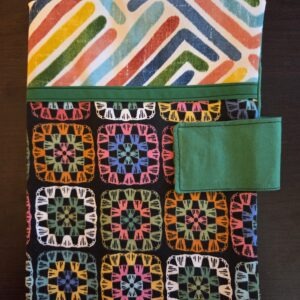 Multicolored fabric Bible case and cover. Velcro closure.