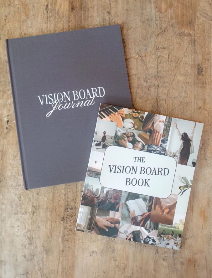 Gray Vision board book and colorful image book sitting on a desk