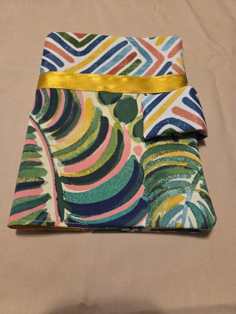 Bible Case, featuring monstera & banana leaves with geometric pattern. Yellow trim and lining.