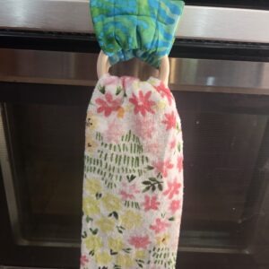 Blue-green, teal kitchen towel hanger turns any kitchen towel into a hanging towel