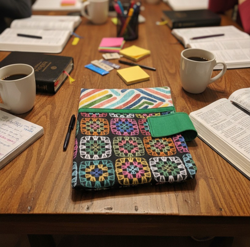 Bible case; granny squares & geometric pattern in jeweltones. Comes with pen/highlighter case to match. Green lining.