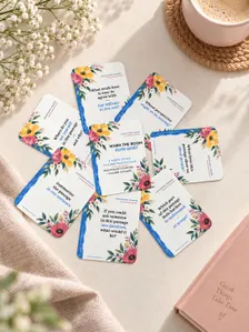 Printable Christian discussion cards arranged on a table with flowers, coffee, and a journal.