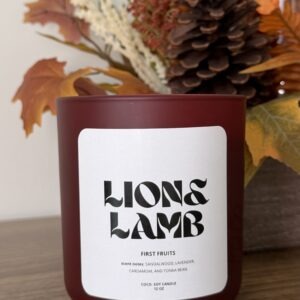 12 oz First Fruits coco-soy candle with a wooden wick in a wine jar